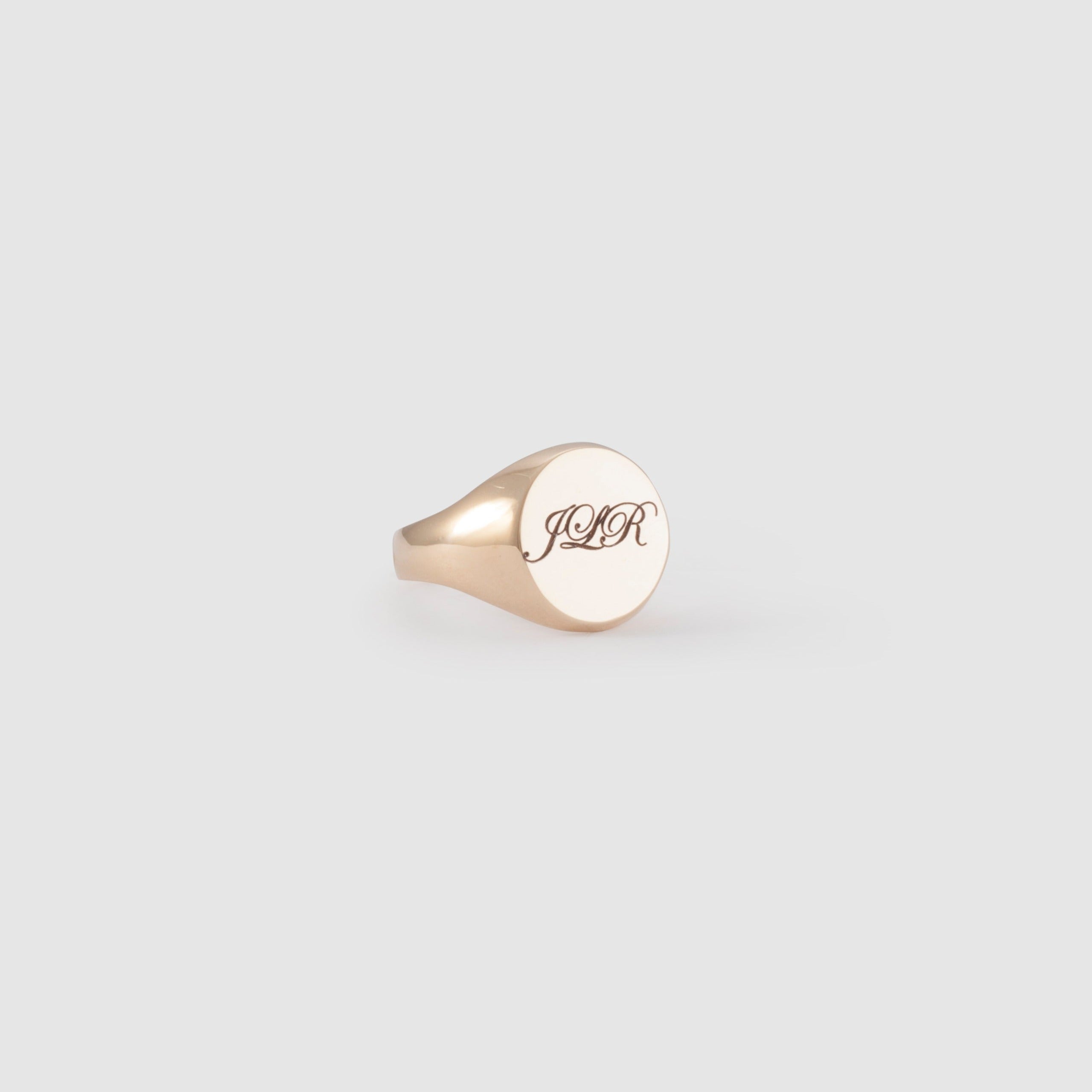 Gold round signet ring with engraving
