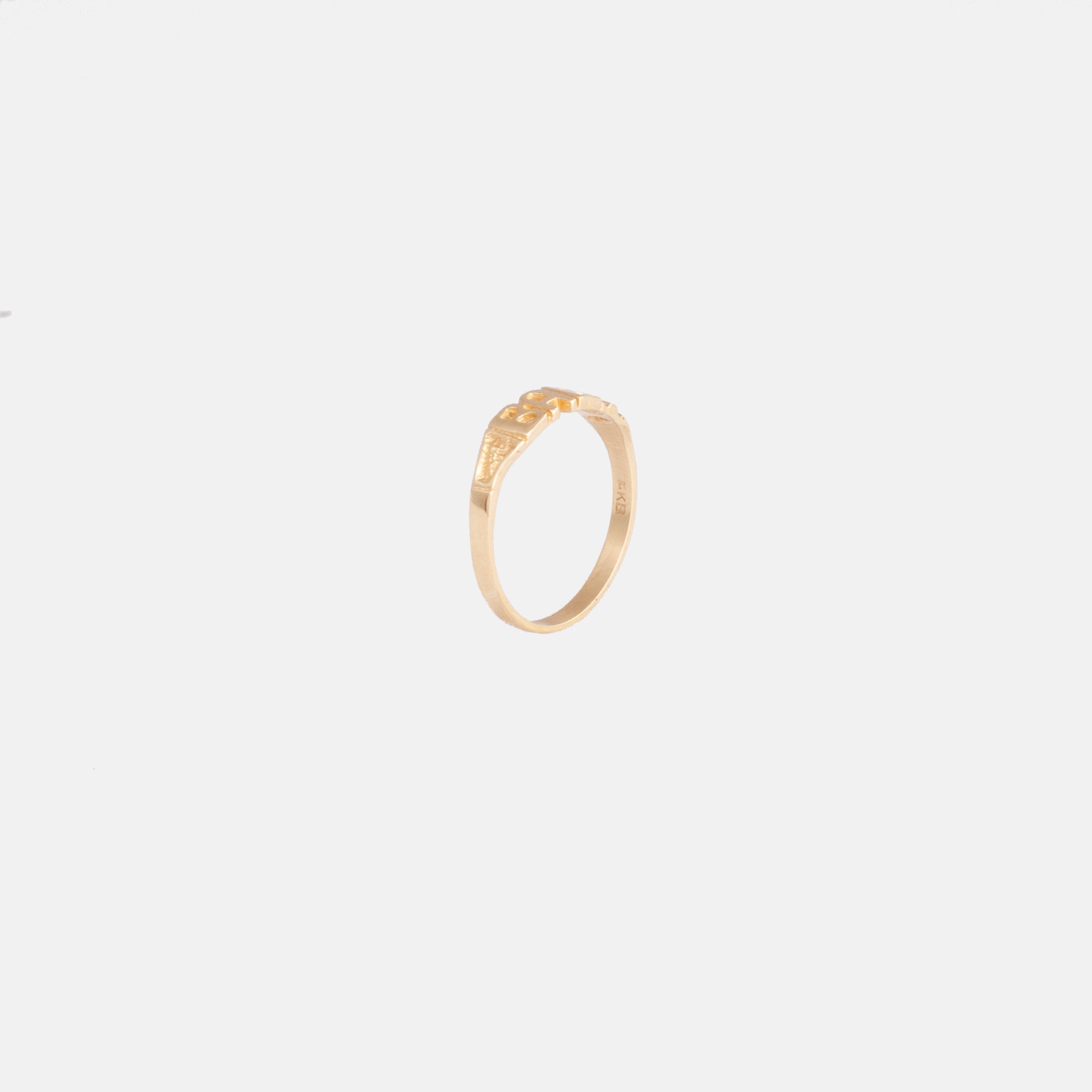 10K yellow gold baby ring with "baby" text