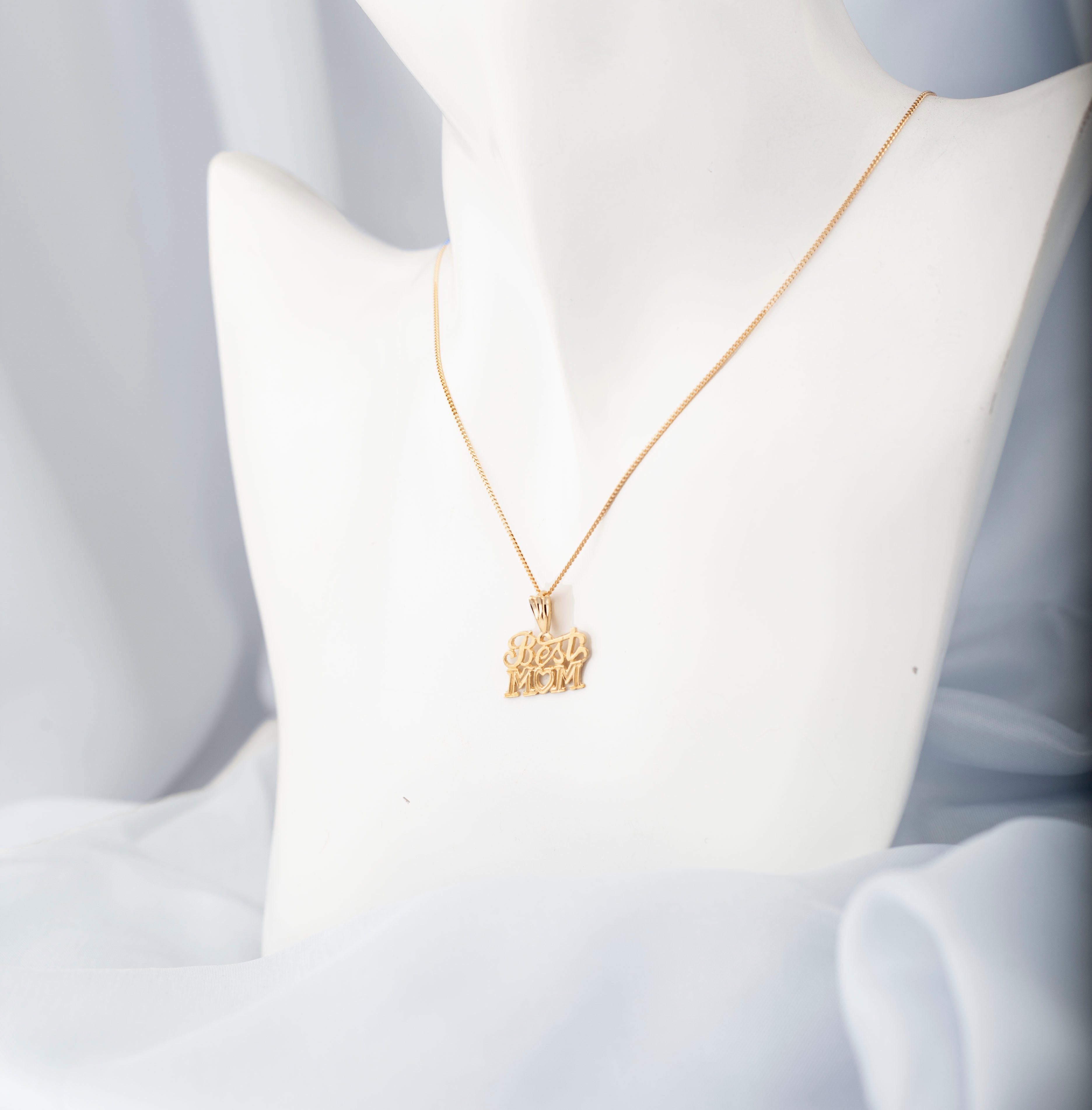 "Best Mom" Pendant in 10K gold with a thin curb chain or figaro chain