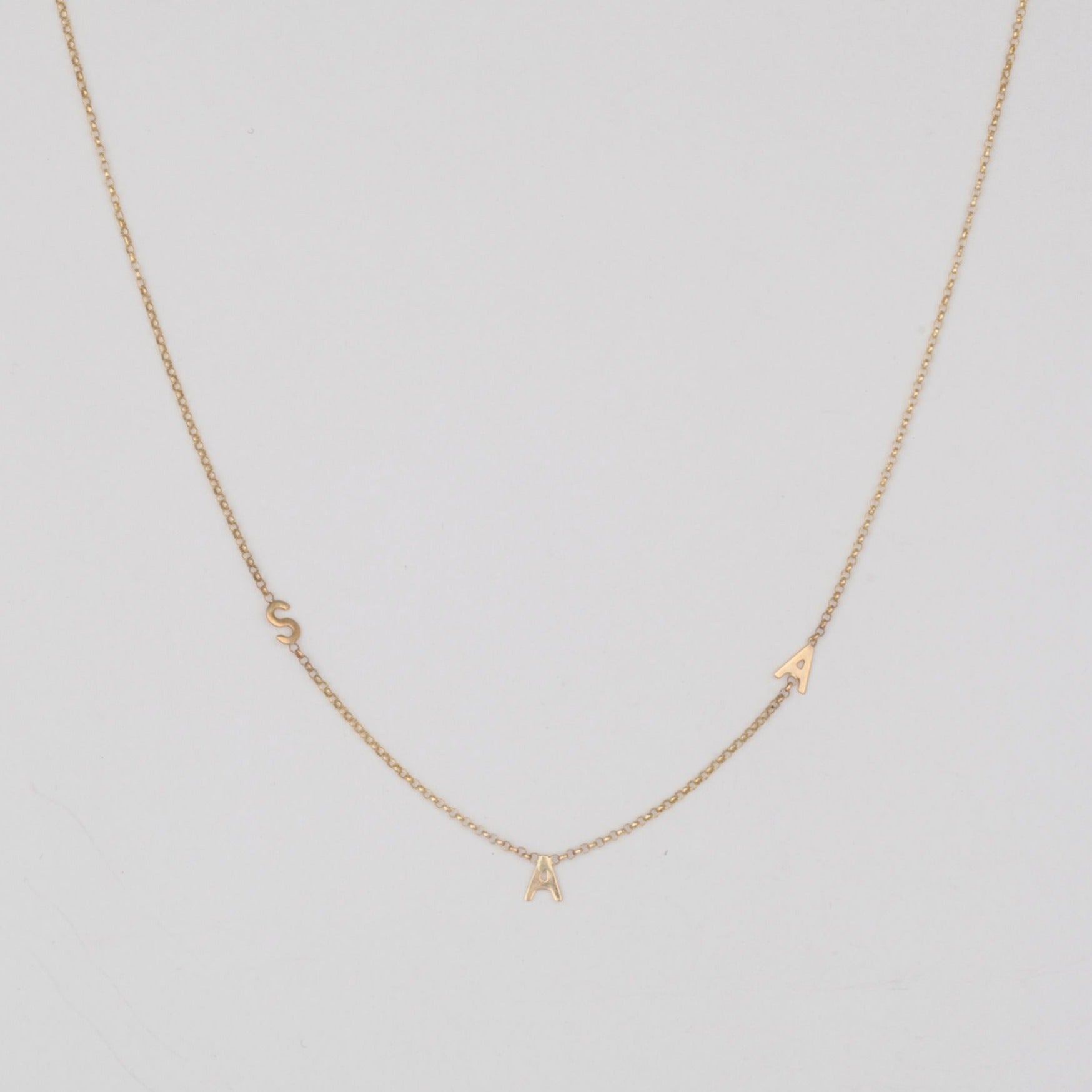 10k Gold Letters Soldered onto a thin Bolo Chain