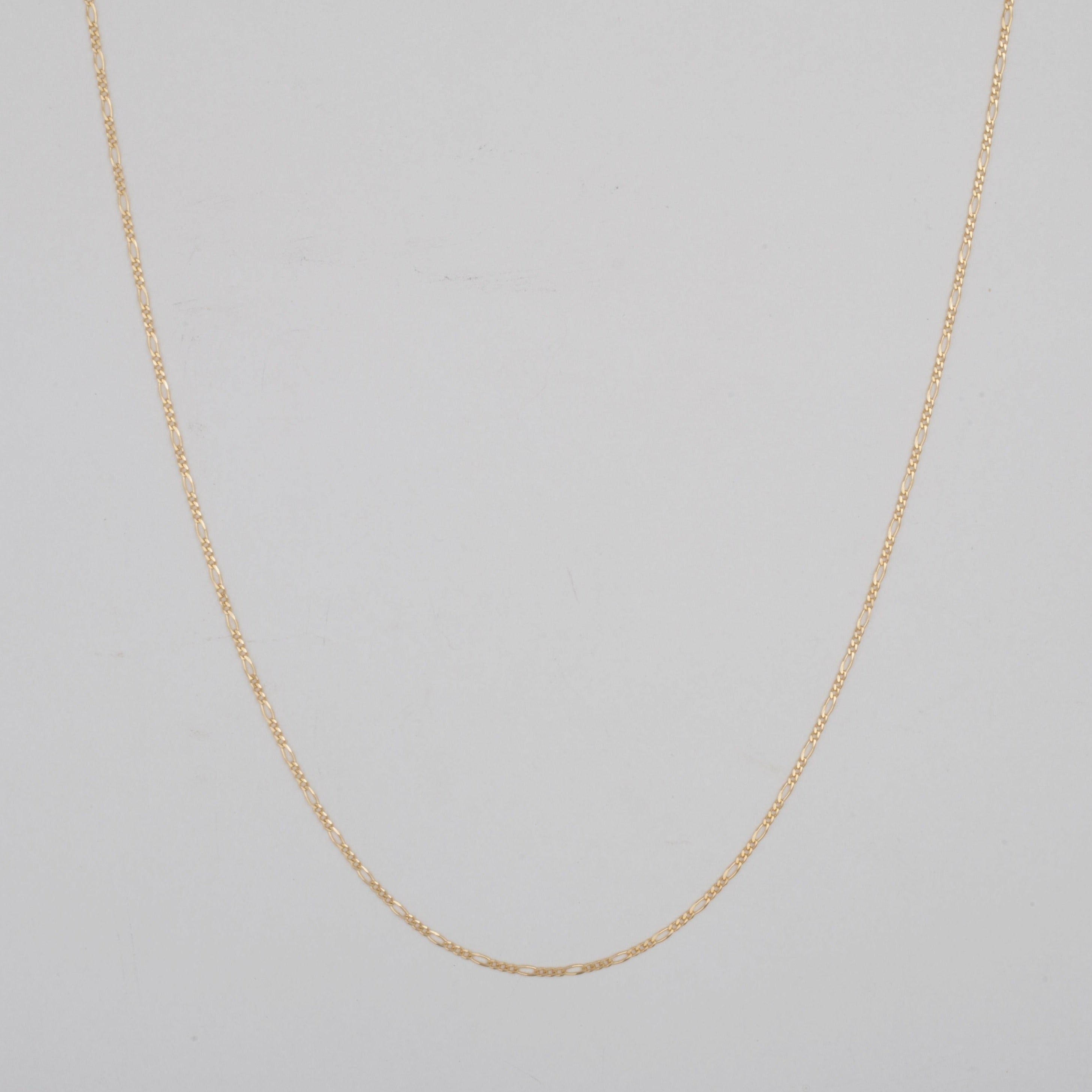10k Thin solid Gold Figaro chain link