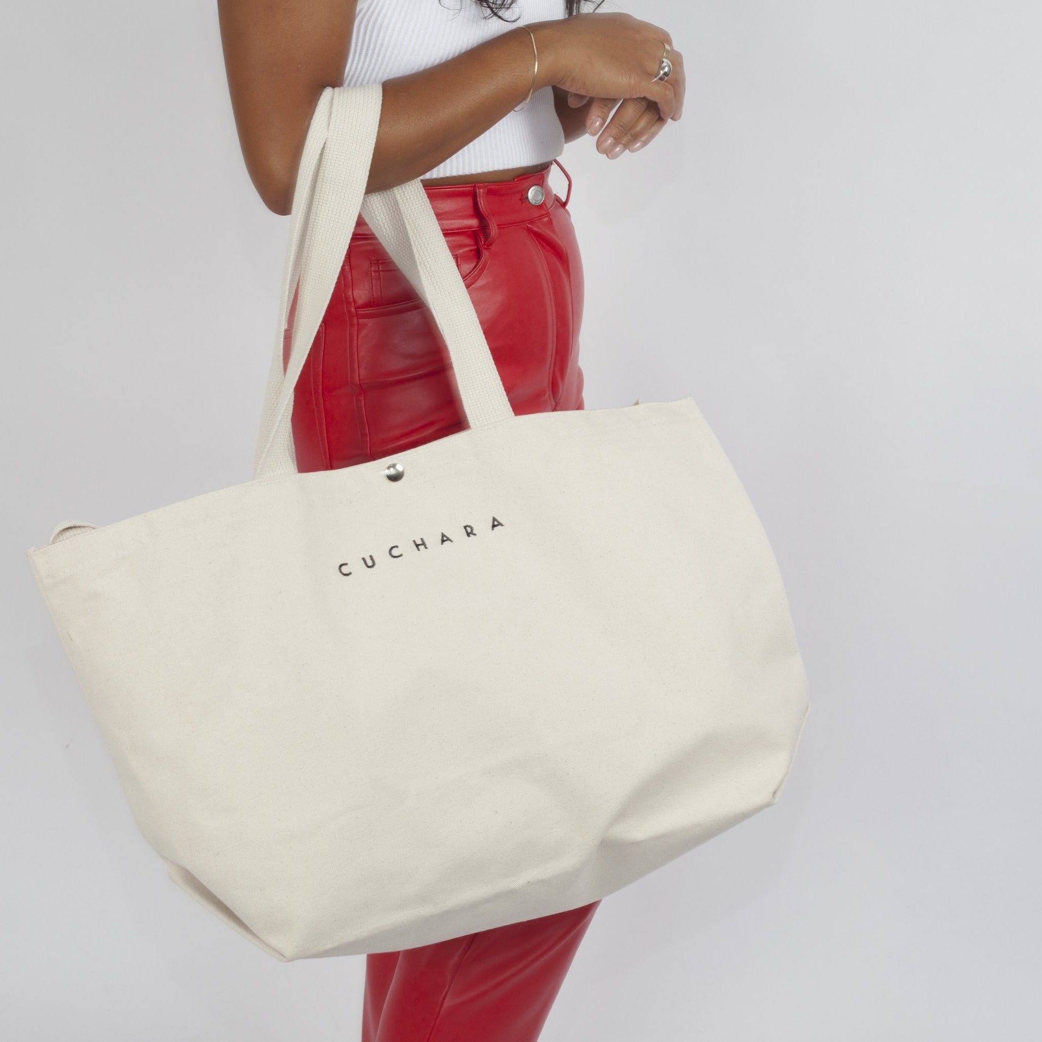 Heavy 15oz Cotton tote bag with Snap Closure in white on model