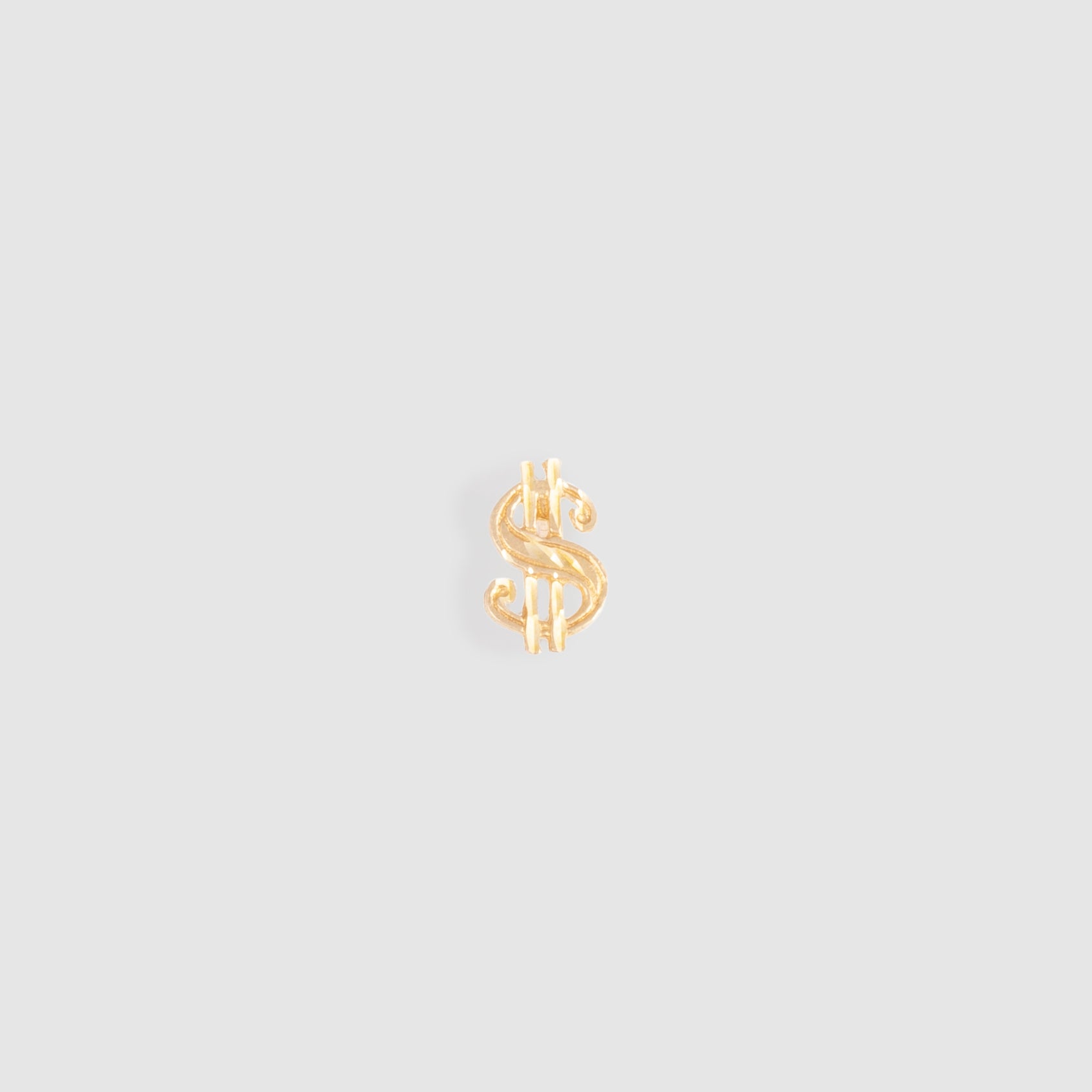 Dollar Sign Stud Earring. Made of 10k Yellow Gold. Stud measures 11mm x 7mm x 1mm 