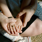 baby wearing 10K yellow gold oval signet ring