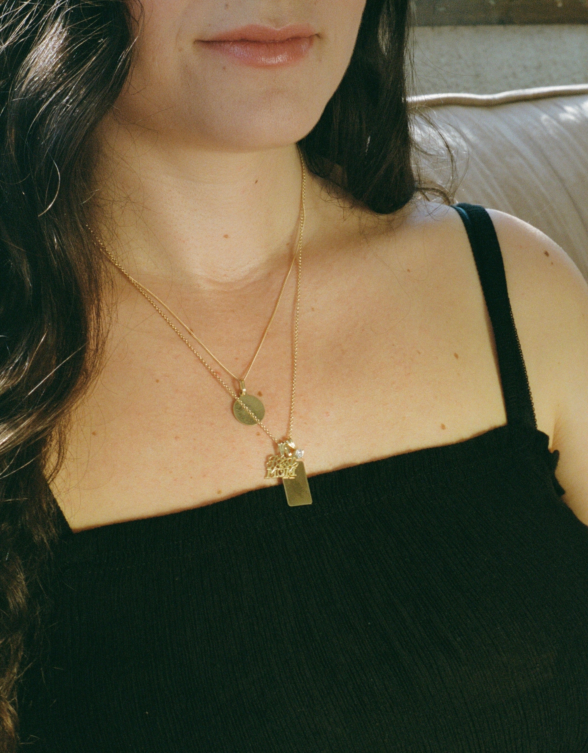 "Best Mom" Pendant in 10K gold with a thin curb chain or figaro chain
