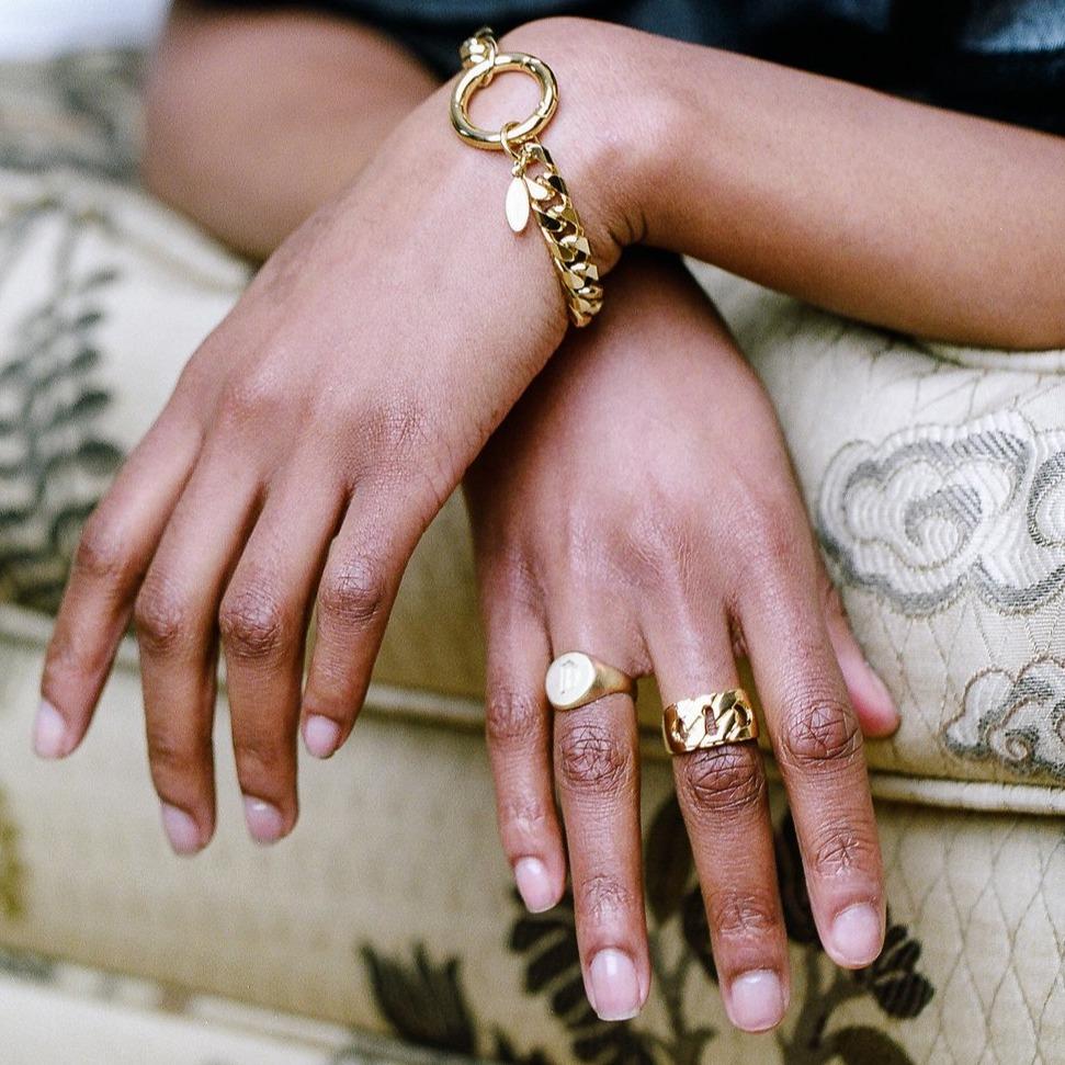 Ring stack featuring Gold round signet ring with engraving