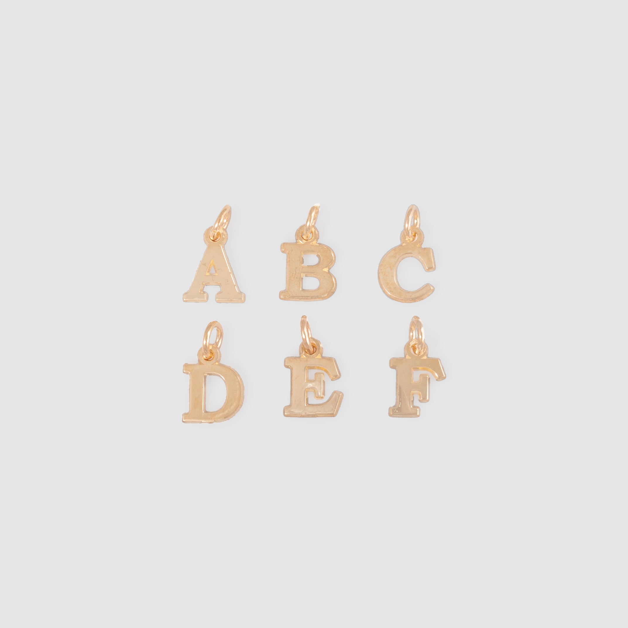 Gold Block Letter Pendants