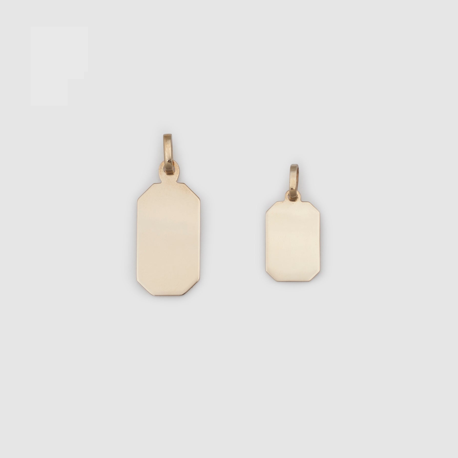 10k solid yellow gold dogtag pendants in large and small