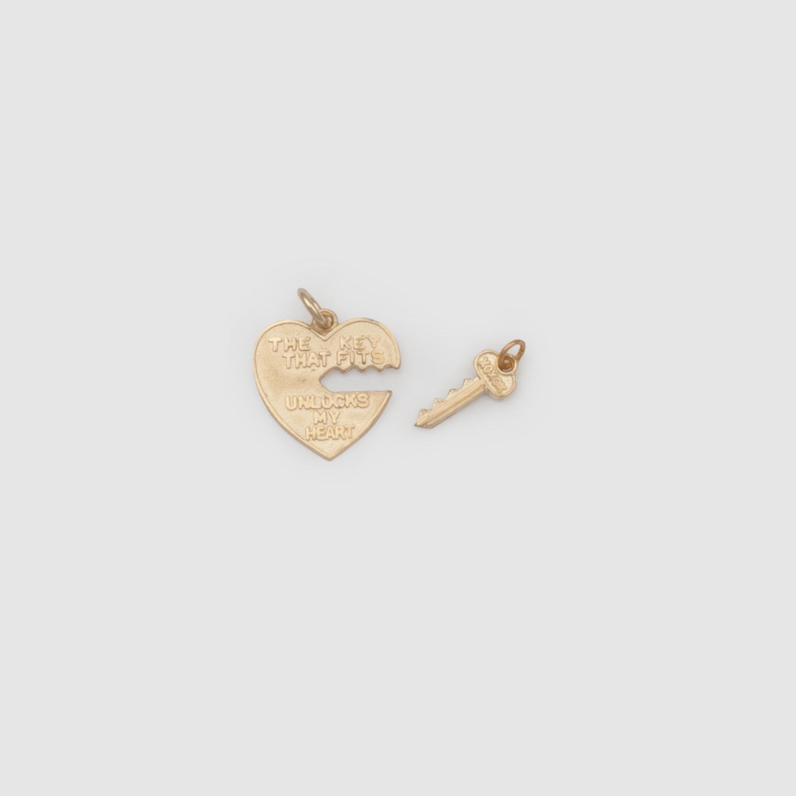 10k solid yellow gold heart and key pendants