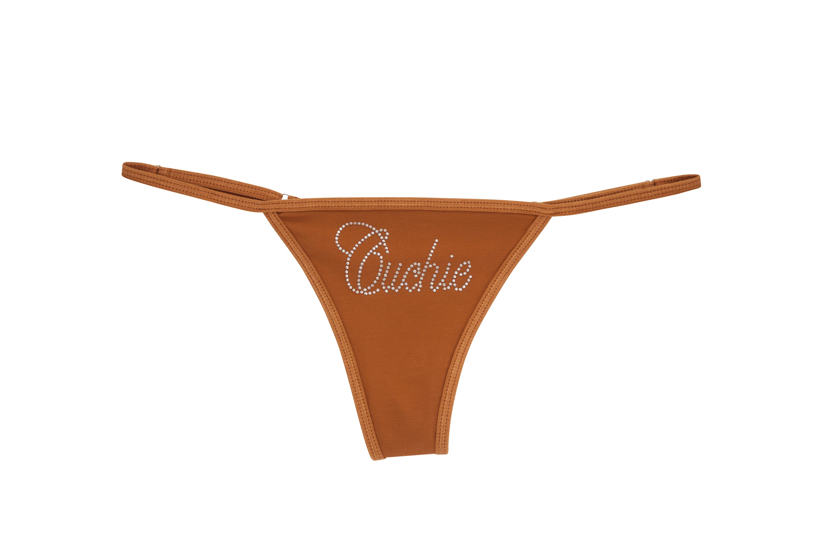 Caramel thong with "Cuchie" text in rhinestones