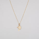 10k gold cross and mary pendant on a thin figaro chain