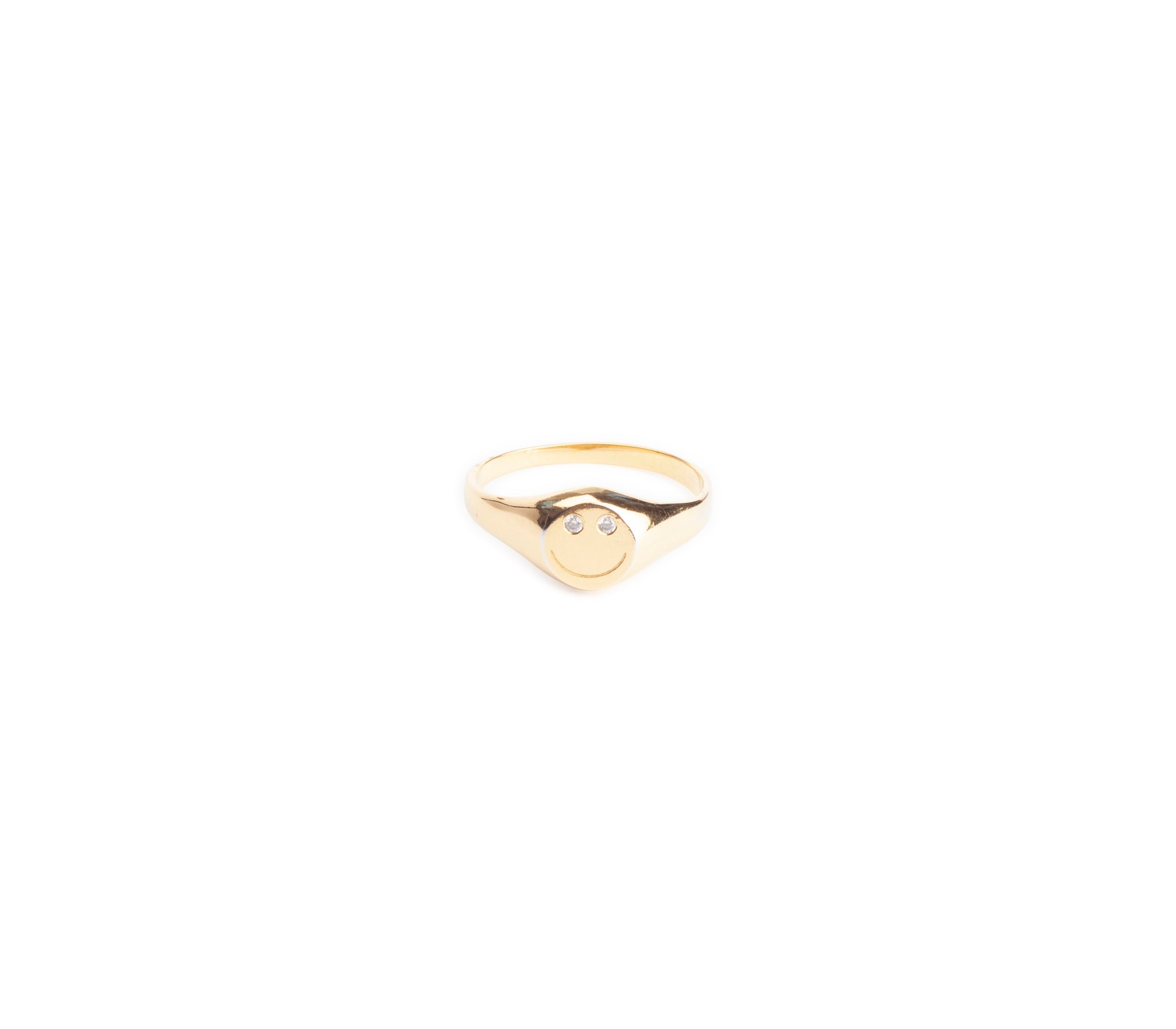 Gold happy face ring