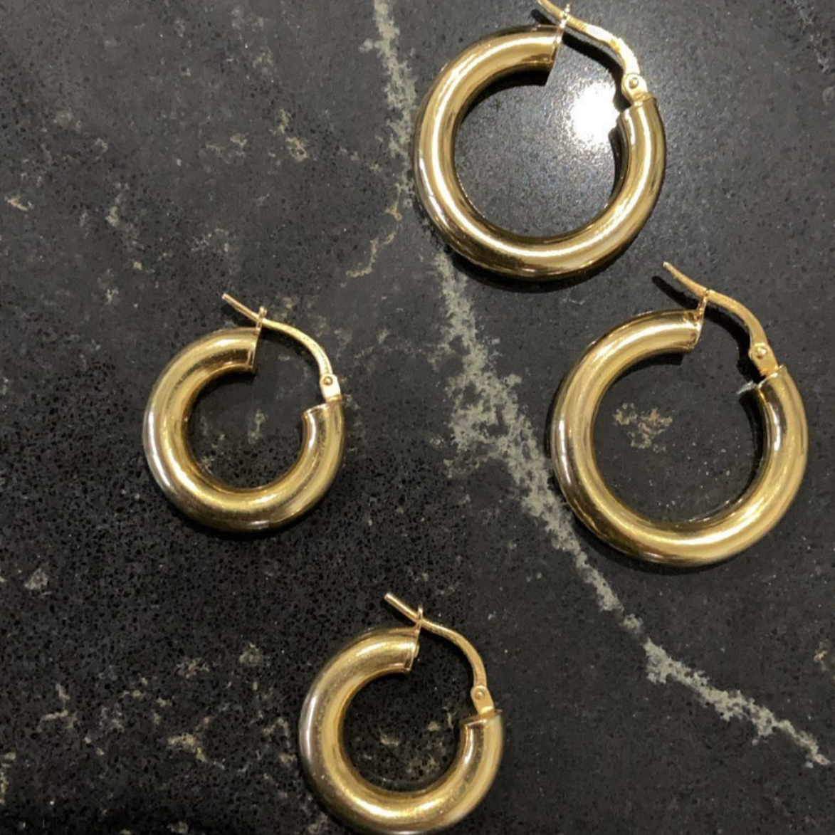Multiple sizes of thick 10k solid yellow gold hoop earrings