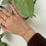 Ring stack featuring 10k yellow gold small dome ring