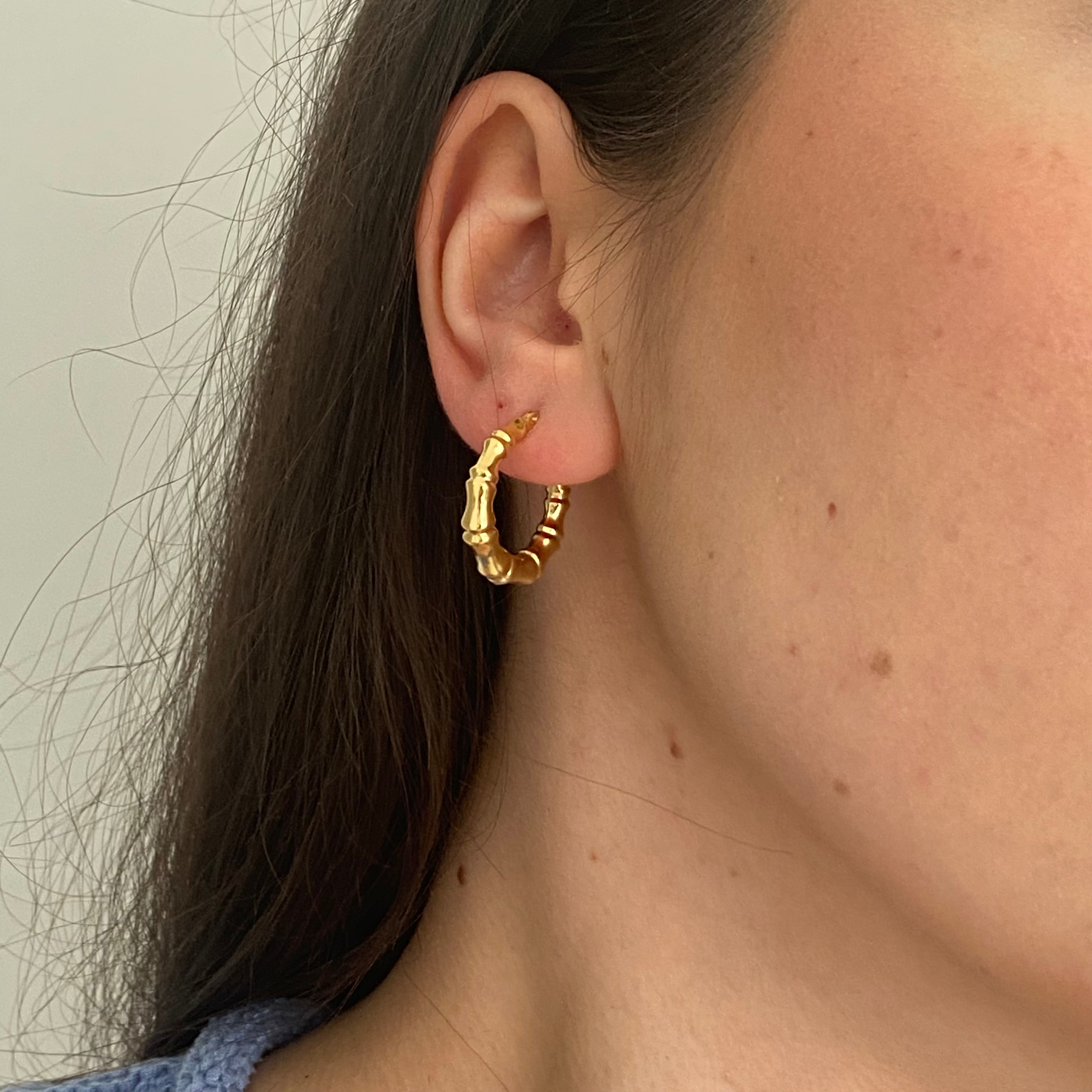 14K gold bamboo detail hoops on figure